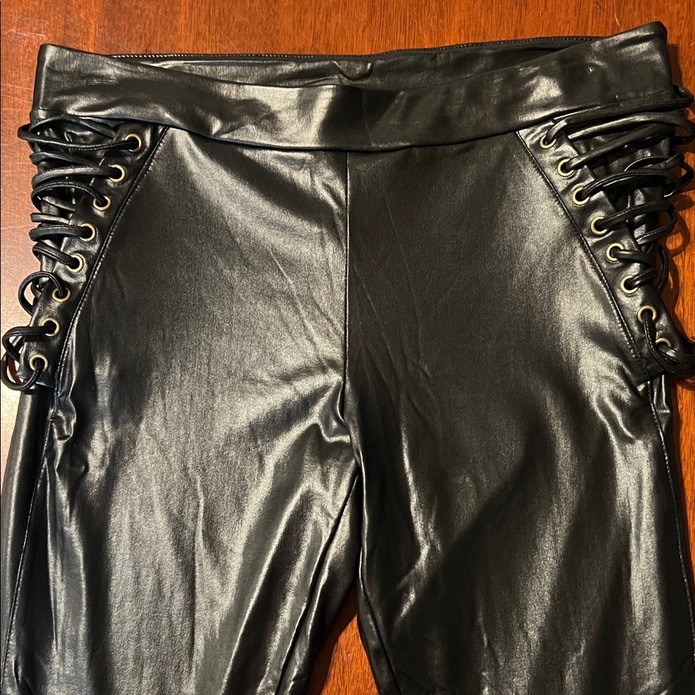 BEBE Black sides Lace-Up latex like Pants